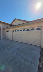 White garage doors with decorative windows