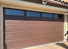 Wood-tone garage door with upper windows